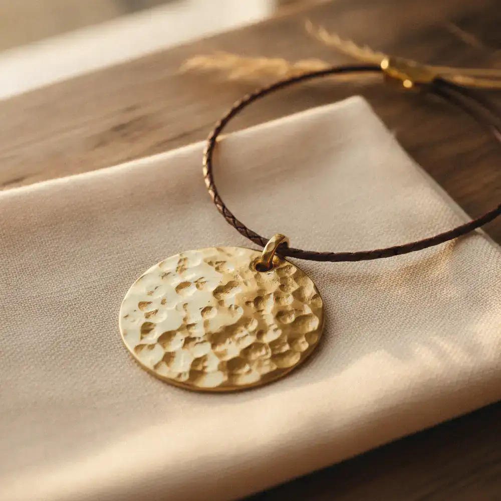 Hand-hammered brass pendant necklace